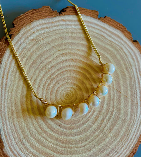 Saltwater pearl and brass